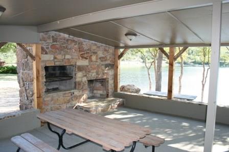 D69 Hensley Road Gordon, TX 76453 - Photo 19 of 34 a living room with furniture and a fireplace