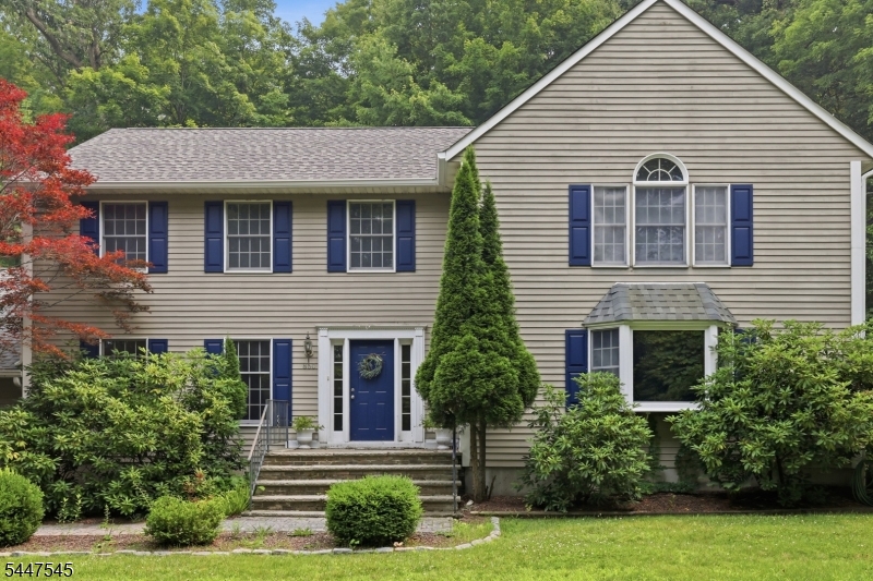 860 Glen Road Sparta, NJ 07871 - Photo 2 of 43 a front view of a house with a yard