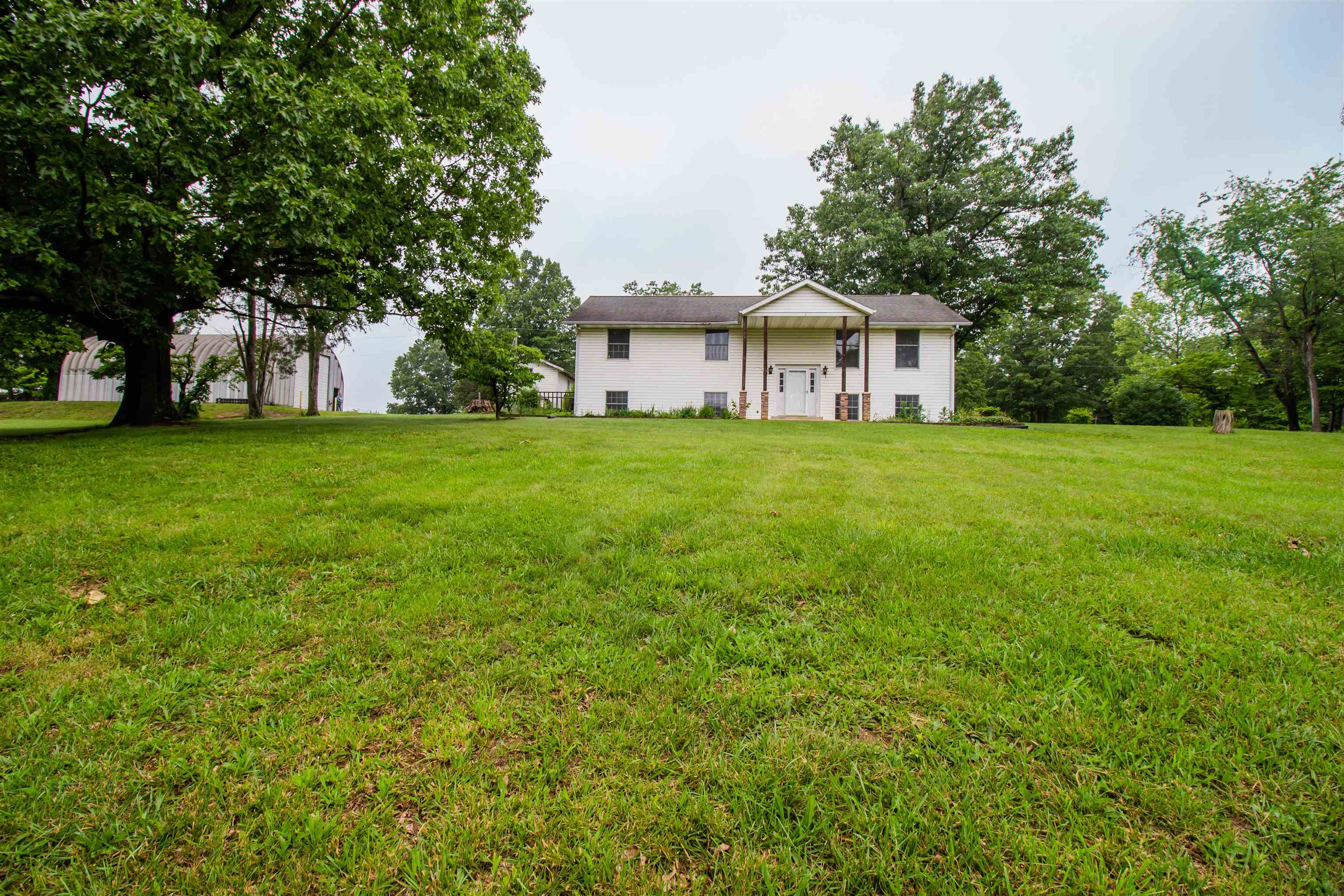 7377 Apple Ridge Drive Timberville, VA 22853 - Photo 2 of 45 a view of a big yard in front of the house
