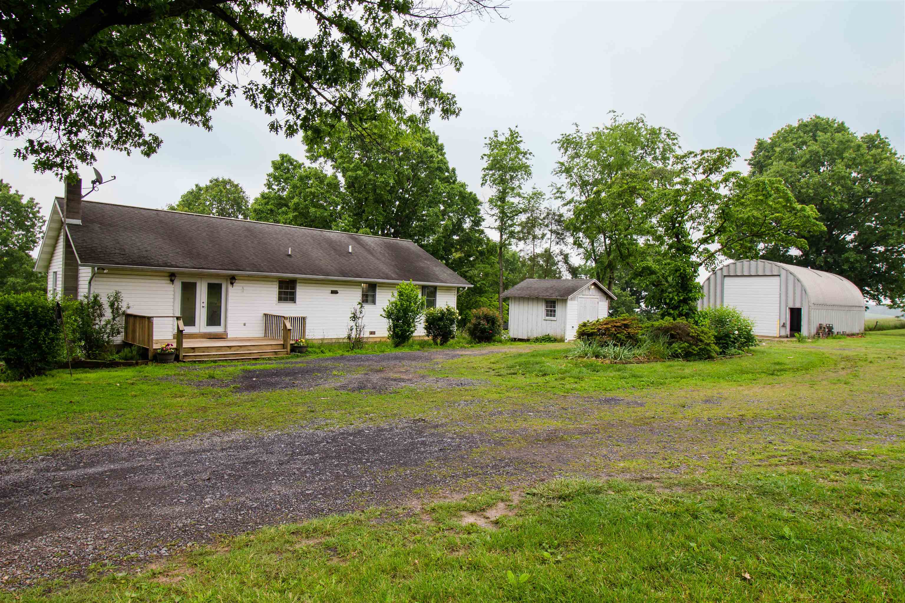 7377 Apple Ridge Drive Timberville, VA 22853 - Photo 29 of 45 a front view of a house with garden