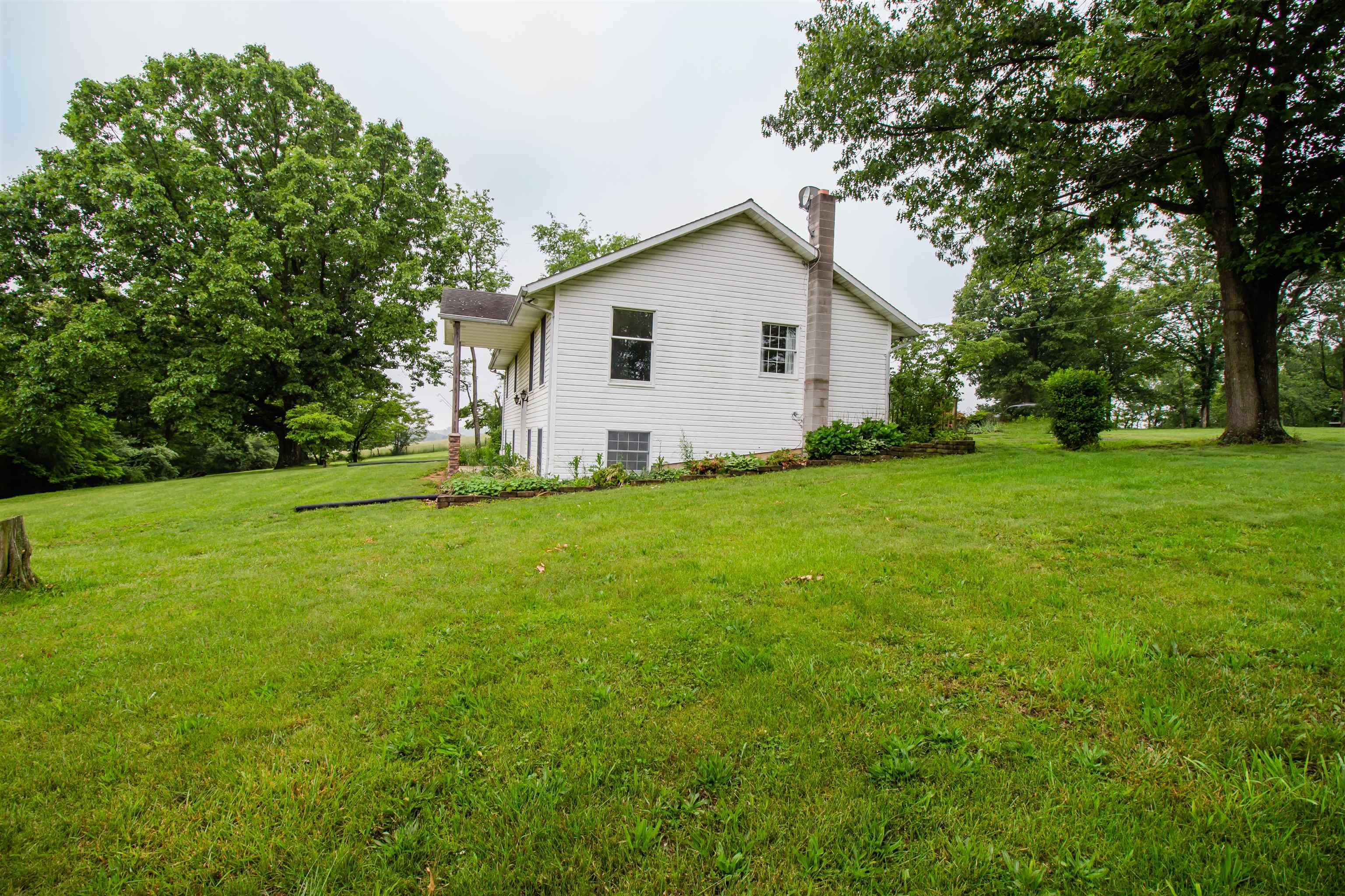 7377 Apple Ridge Drive Timberville, VA 22853 - Photo 40 of 45 a view of a backyard with a garden