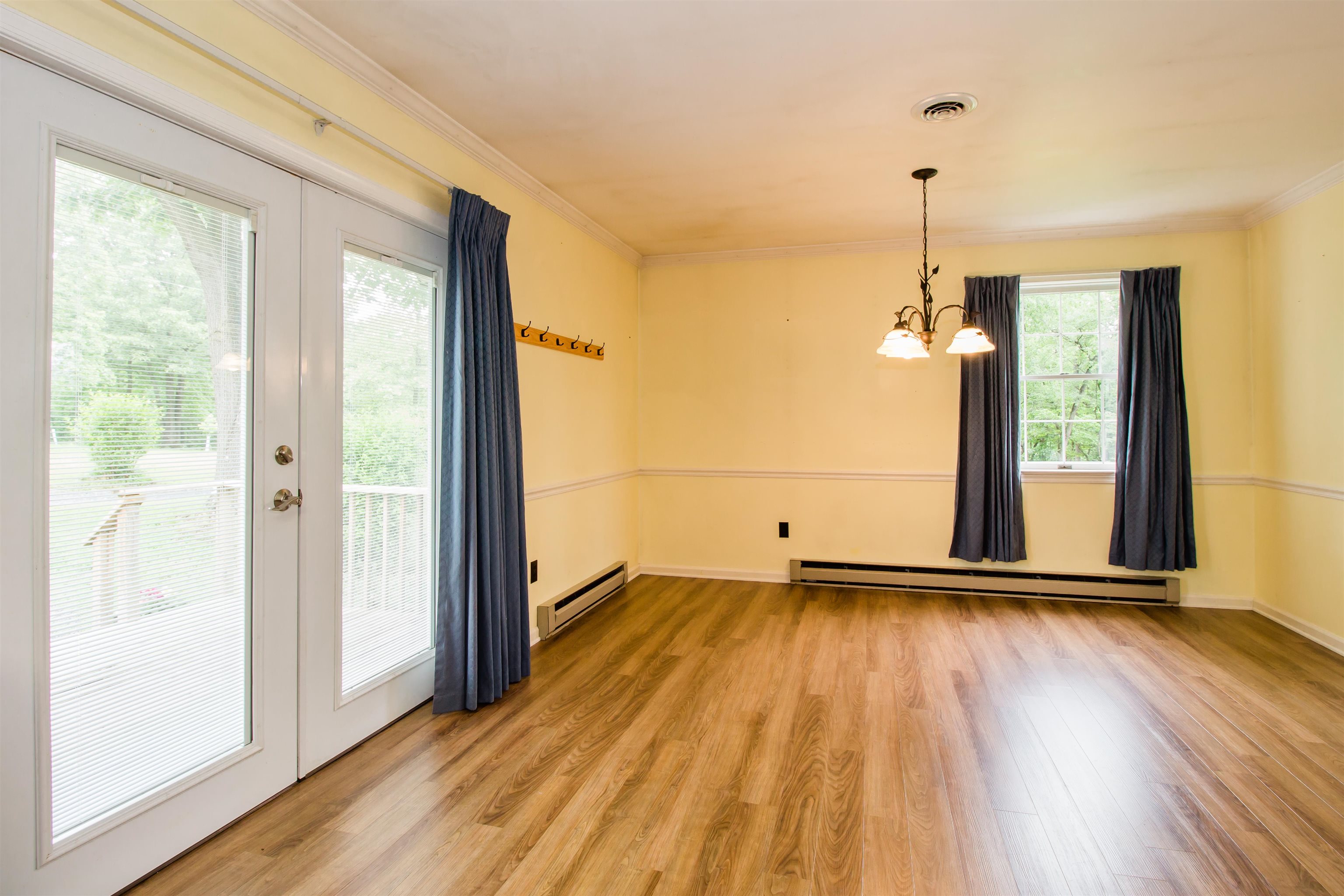 7377 Apple Ridge Drive Timberville, VA 22853 - Photo 7 of 45 a view of a room with wooden floor and a window