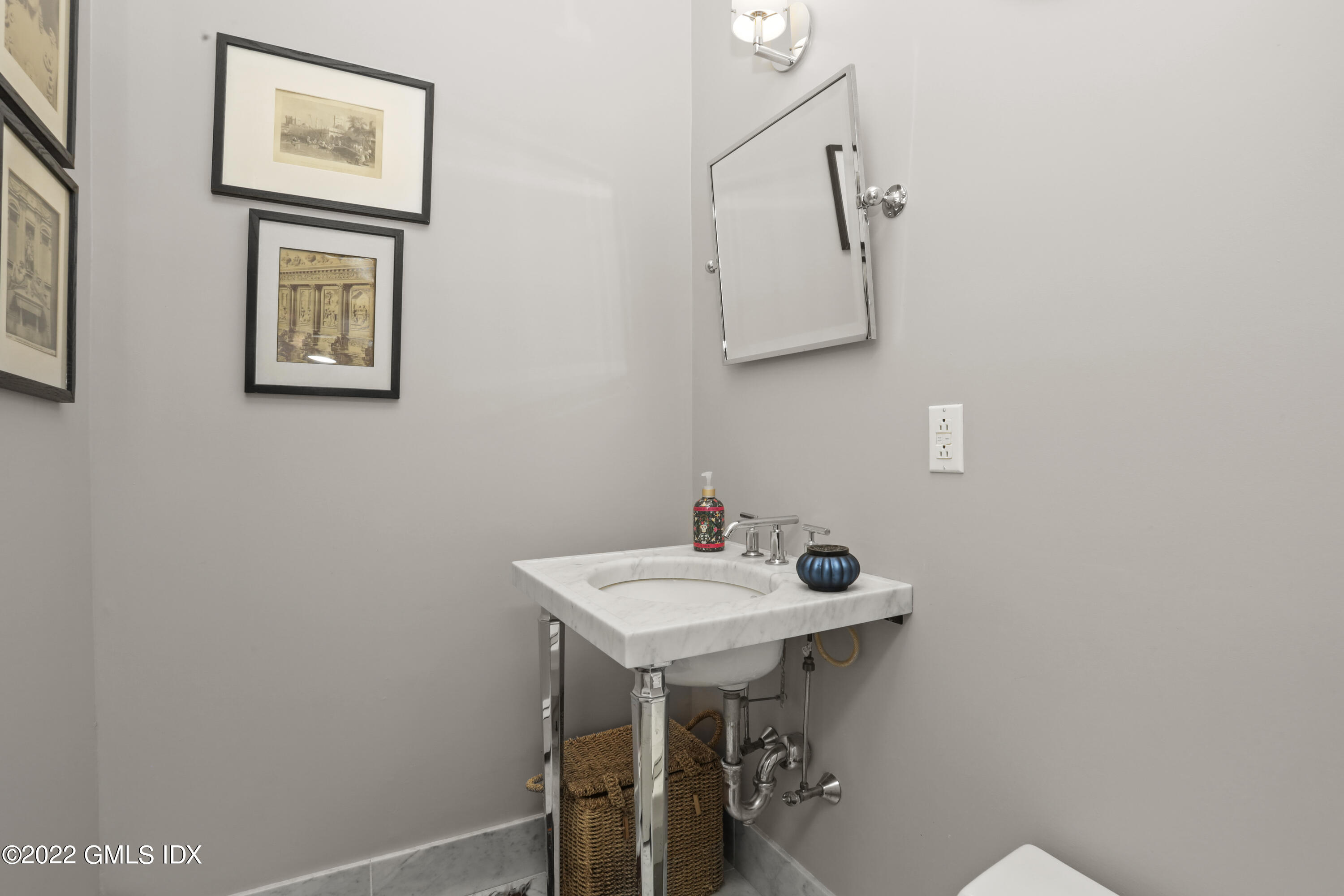 12 Maher Avenue Greenwich, CT 06830 - Photo 11 of 34 a bathroom with a sink and a mirror