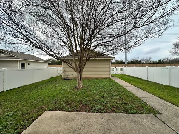 a view of a backyard with a garden