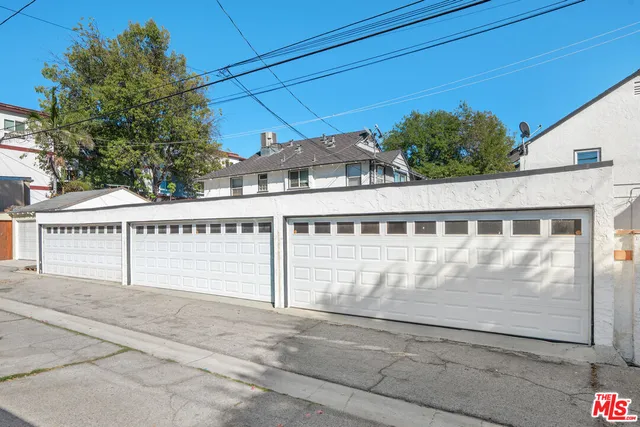 a front view of a house with a garage