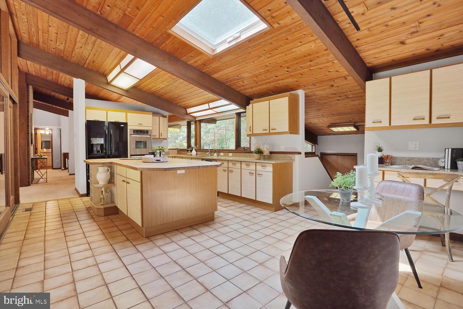 1017 Towlston Road McLean, VA 22102 - Photo 17 of 56 Kitchen + Breakfast Area with Skylight