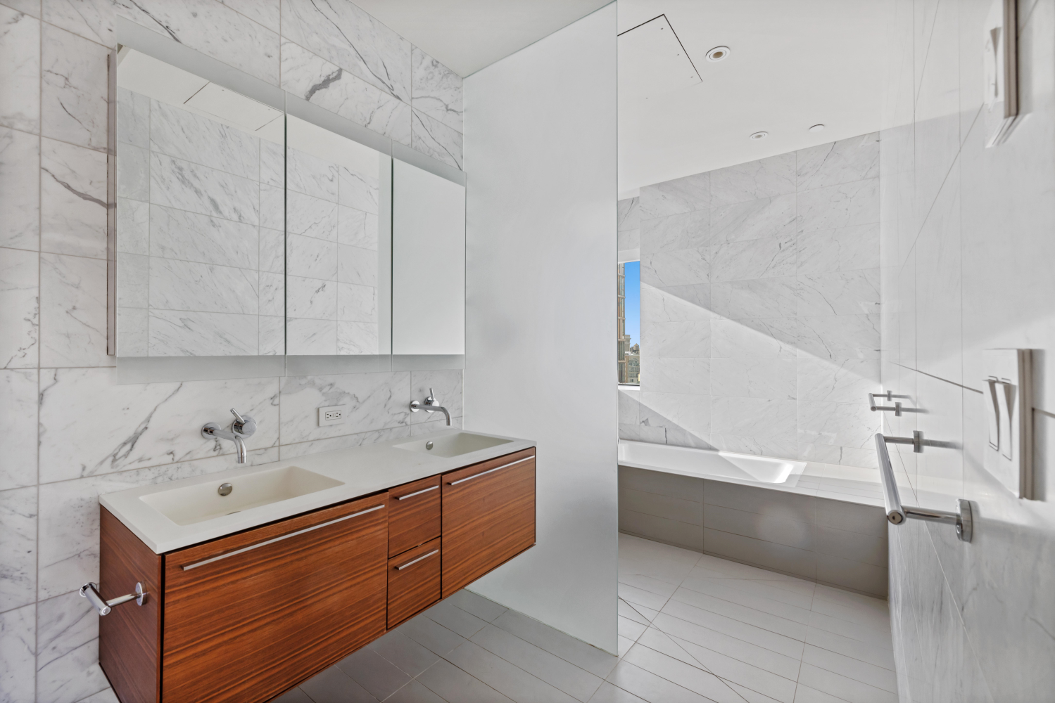 123 3rd Avenue, Unit 15A Manhattan, NY 10003 - Photo 15 of 27 a bathroom with a sink and a bathtub