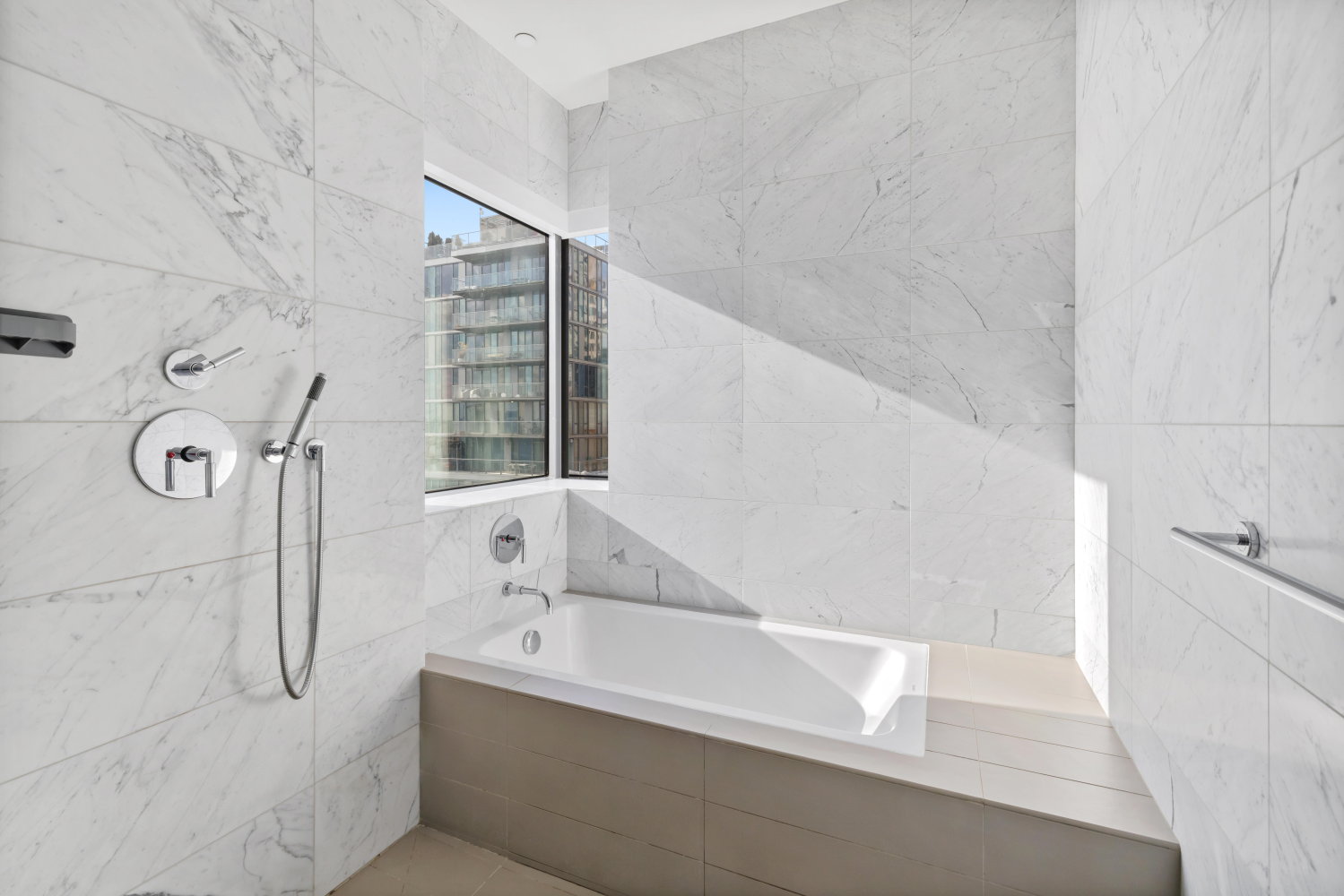 123 3rd Avenue, Unit 15A Manhattan, NY 10003 - Photo 16 of 27 a bathroom with a bathtub and a shower