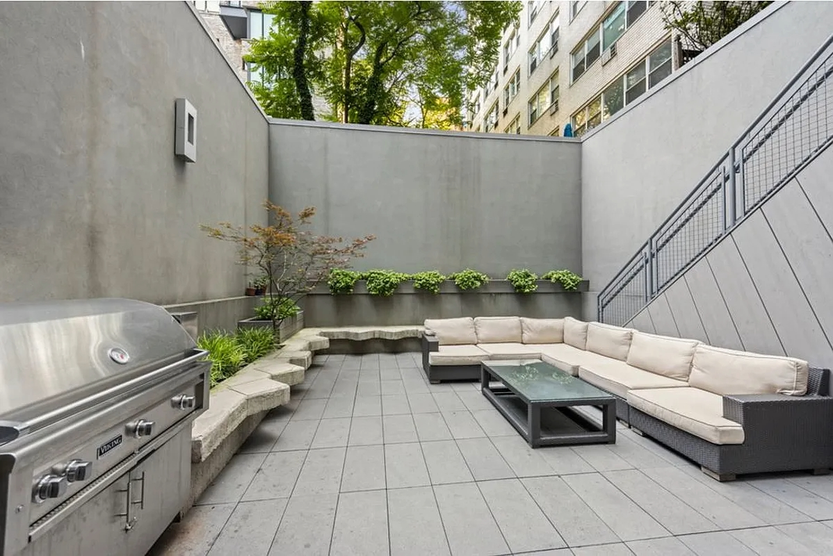 123 3rd Avenue, Unit 15A Manhattan, NY 10003 - Photo 25 of 27 a terrace with outdoor seating and plants