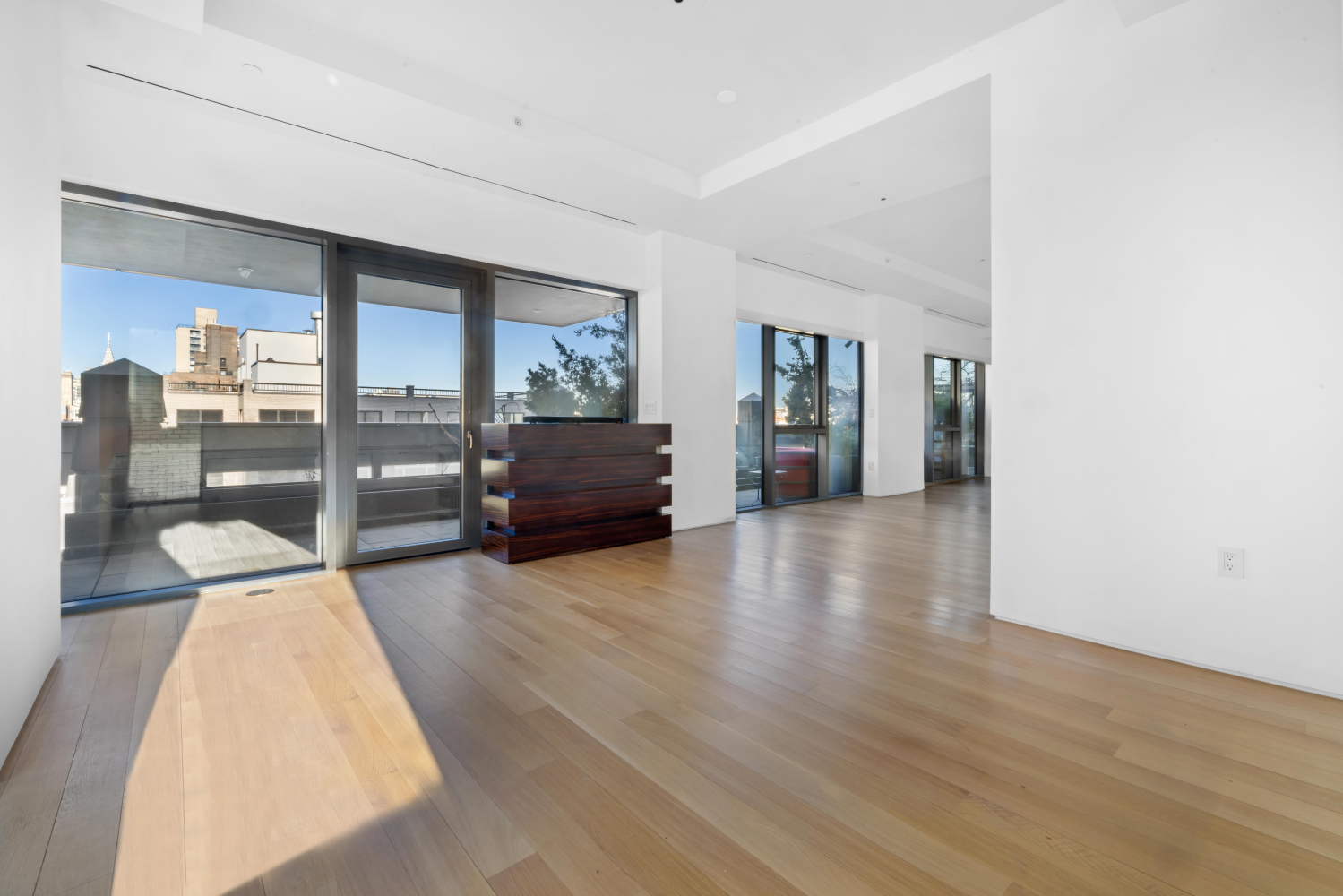 123 3rd Avenue, Unit 15A Manhattan, NY 10003 - Photo 4 of 27 a view of livingroom with furniture and wooden floor