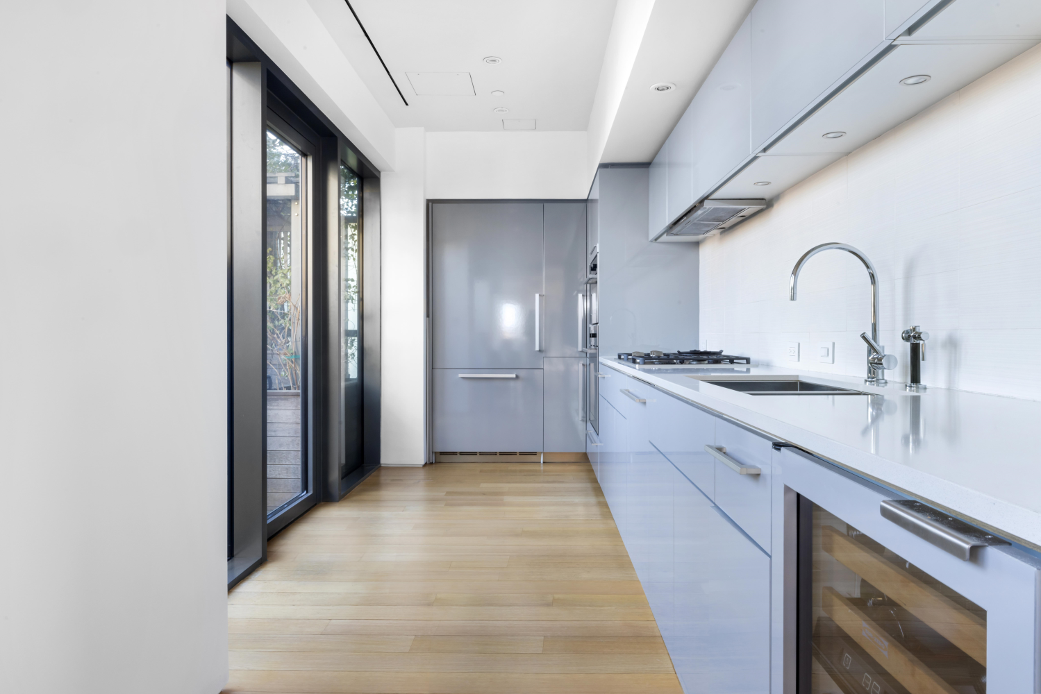 123 3rd Avenue, Unit 15A Manhattan, NY 10003 - Photo 7 of 27 a kitchen with a sink and cabinets