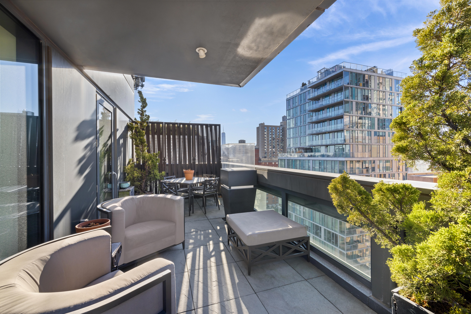 123 3rd Avenue, Unit 15A Manhattan, NY 10003 - Photo 8 of 27 a balcony with furniture and a potted plant