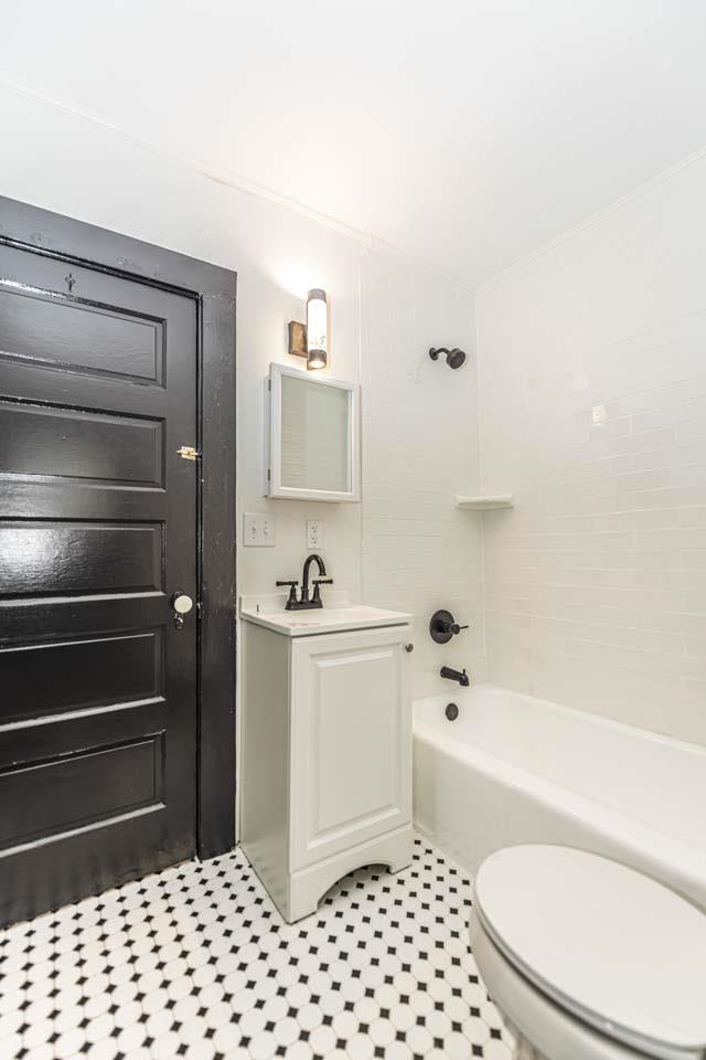 4615 Highway 54 Covington, TN 38019 - Photo 17 of 24 a bathroom with a sink a toilet and a bathtub