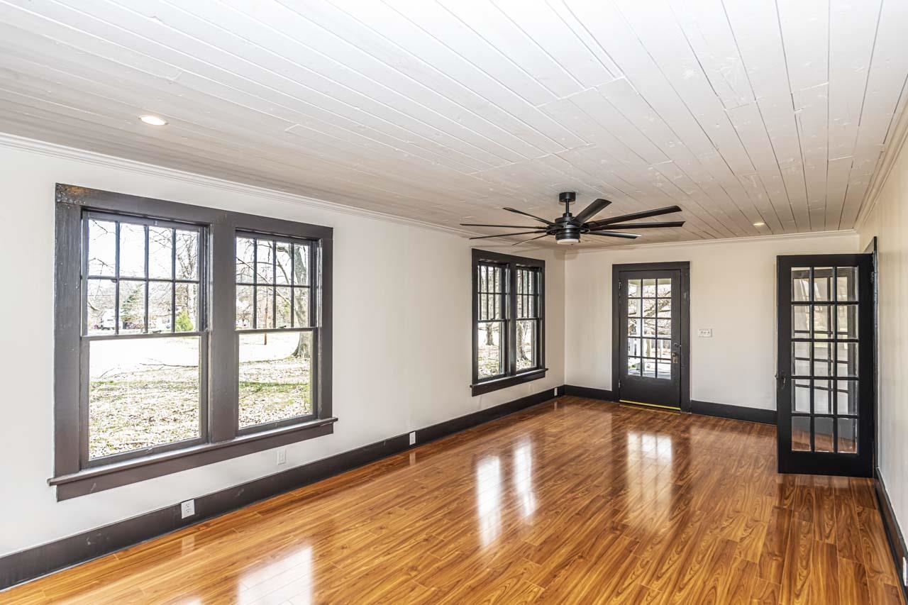 4615 Highway 54 Covington, TN 38019 - Photo 5 of 24 a view of an empty room with a window and wooden floor