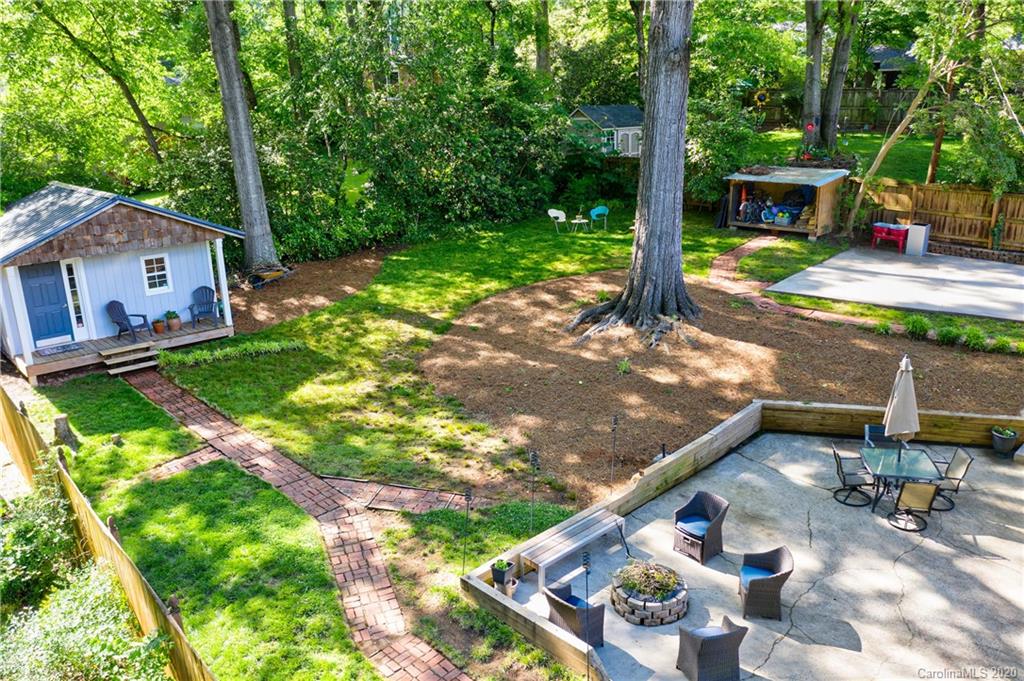 7026 Morganford Road Charlotte, NC 28211 - Photo 29 of 35 a backyard of a house with seating space