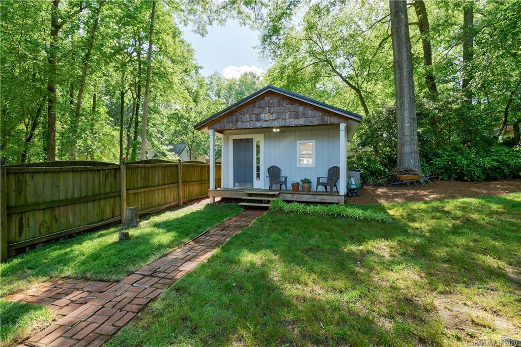 7026 Morganford Road Charlotte, NC 28211 - Photo 30 of 35 a view of a house with backyard and garden