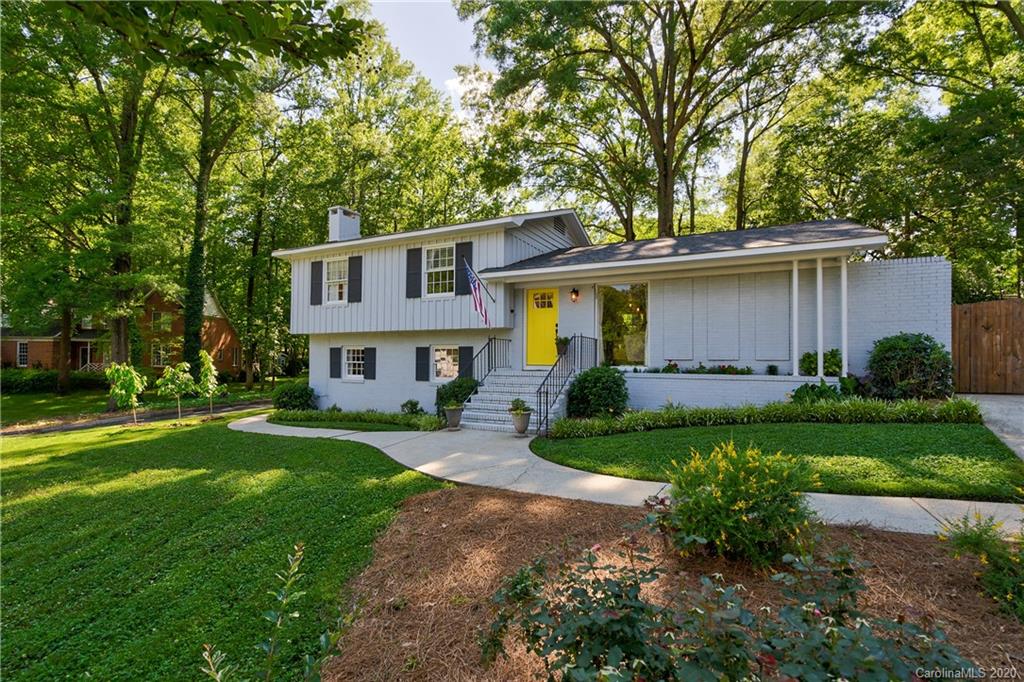7026 Morganford Road Charlotte, NC 28211 - Photo 34 of 35 a front view of a house with garden