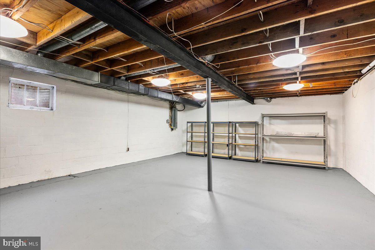 7128 Devonshire Road Alexandria, VA 22307 - Photo 30 of 36 a view of an empty room with a garage