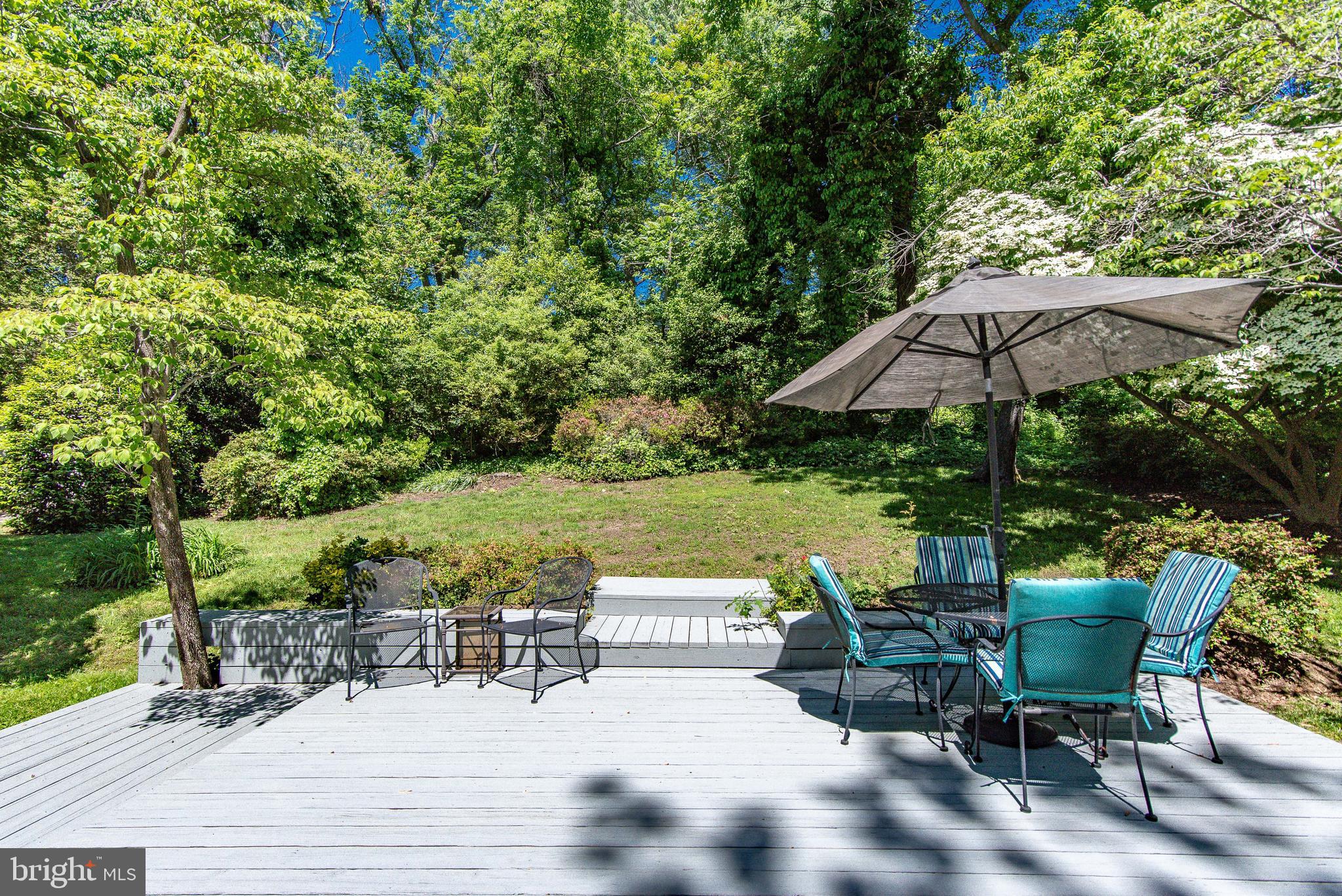 7128 Devonshire Road Alexandria, VA 22307 - Photo 31 of 36 a view of backyard with seating space and trees