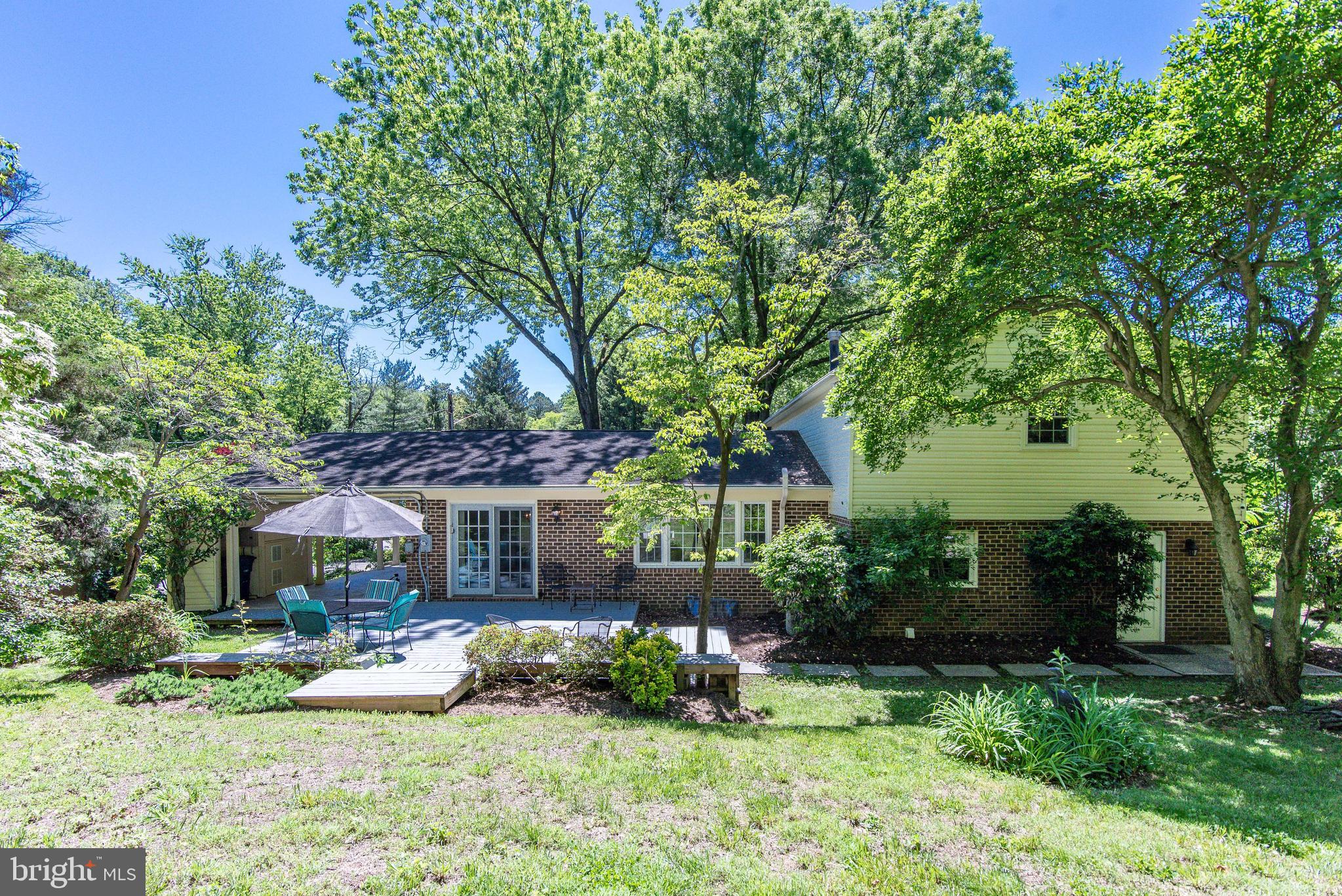 7128 Devonshire Road Alexandria, VA 22307 - Photo 34 of 36 front view of a house with a yard