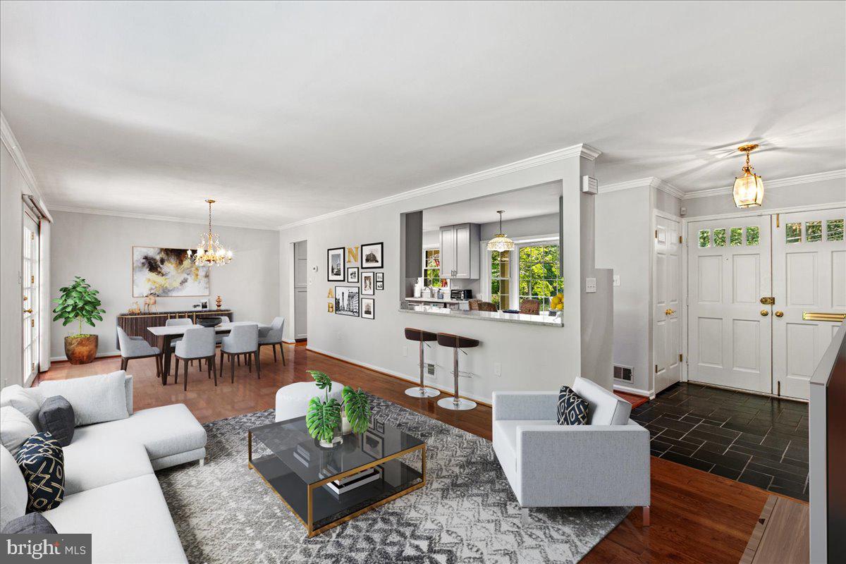 7128 Devonshire Road Alexandria, VA 22307 - Photo 6 of 36 a living room with furniture and a large window