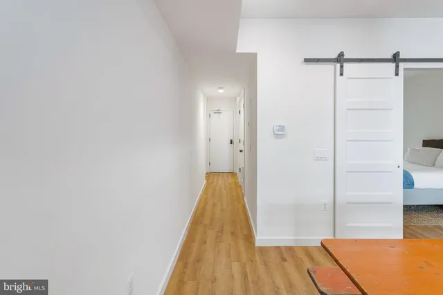 a bathroom with a tub and shower