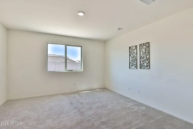 an empty room with an entryway