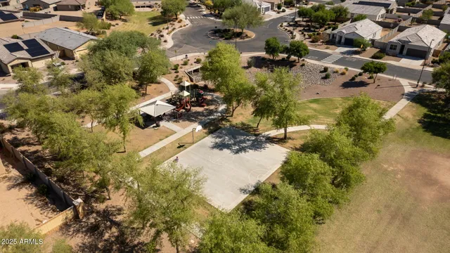 a view of a house with a tree