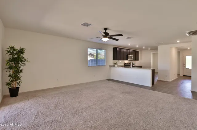 a view of a kitchen with furniture and a kitchen