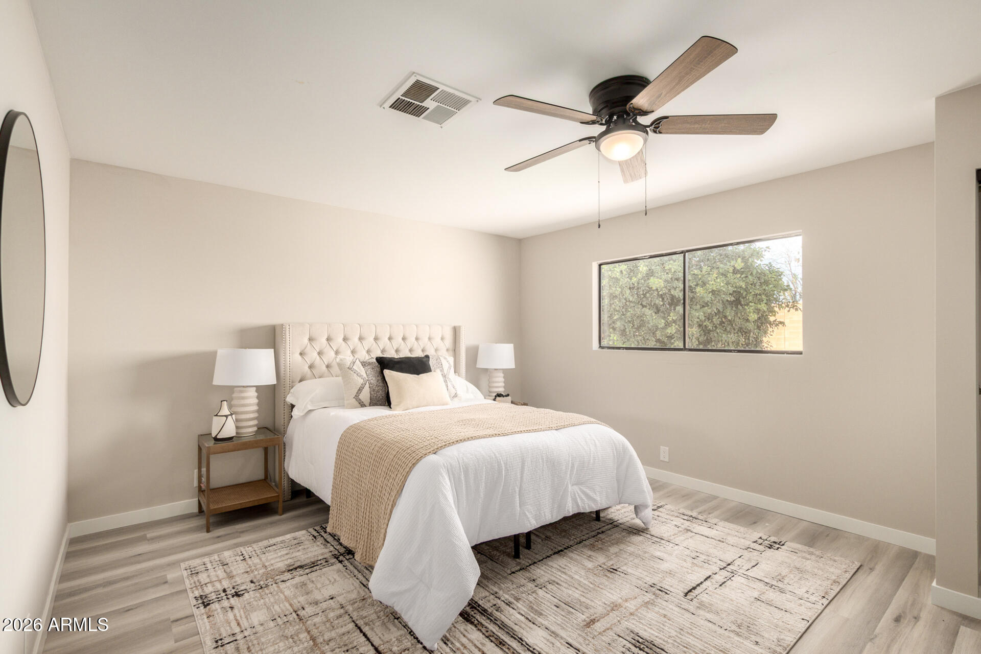 422 South 80th Way Mesa, AZ 85208 - Photo 17 of 28 a bedroom with a bed and window