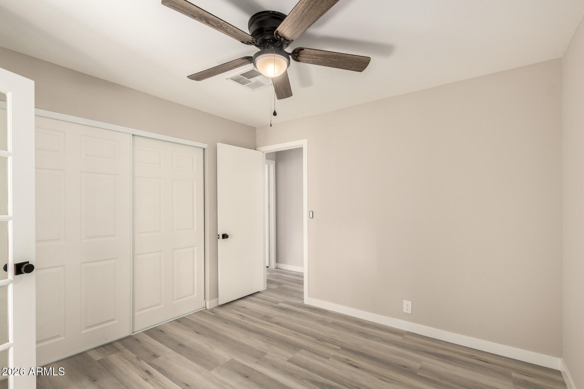 422 South 80th Way Mesa, AZ 85208 - Photo 23 of 28 wooden floor in an empty room