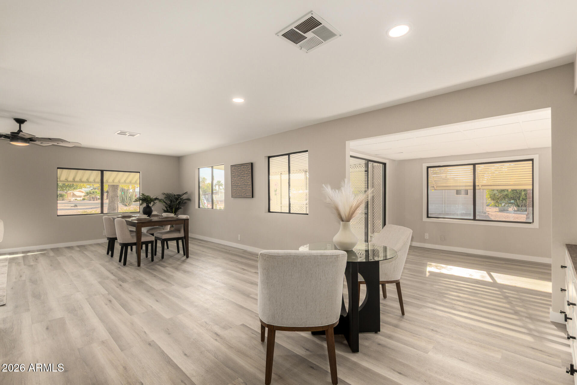 422 South 80th Way Mesa, AZ 85208 - Photo 8 of 28 a living room with furniture and a wooden floor