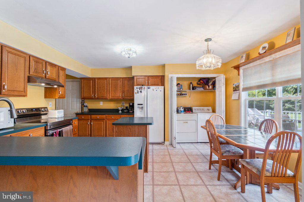 244 Leppo Road Westminster, MD 21158 - Photo 15 of 51 Kitchen and laundry