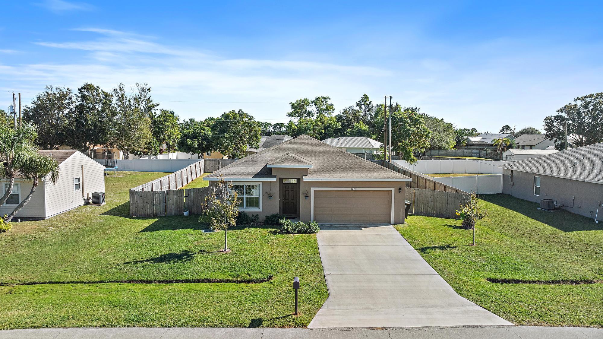2291 Southeast Merrill Road Port St. Lucie, FL 34952 - Photo 2 of 30 2291 SE Merrill Road aerials-1