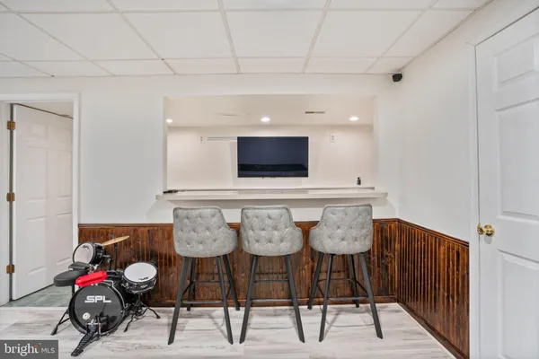 a room with furniture and wooden floor