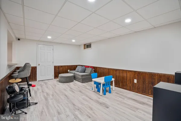 a view of workspace with wooden floor