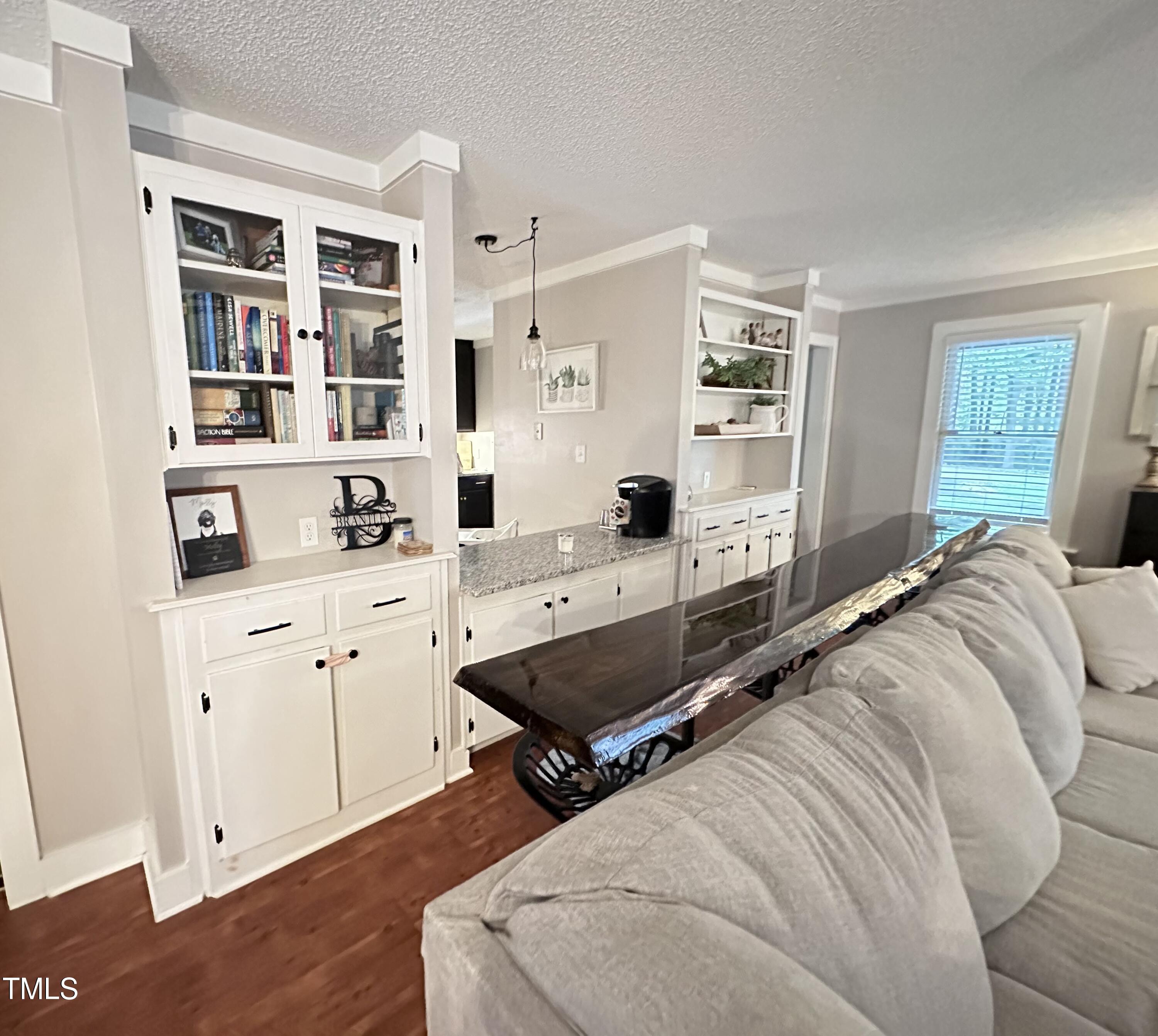 8937 Buck Deans Road Middlesex, NC 27557 - Photo 8 of 24 a living room with stainless steel appliances furniture and decor