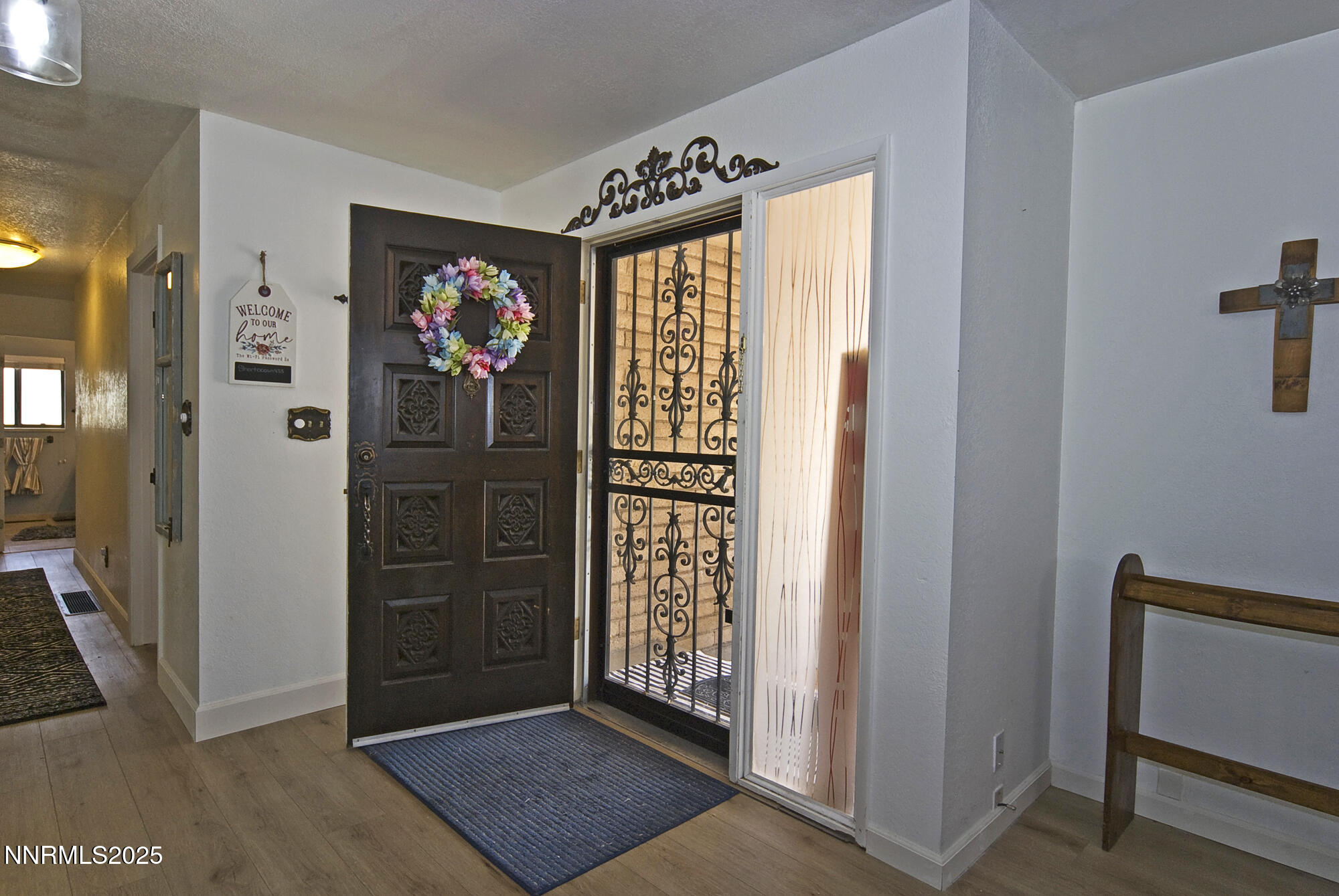 5705 Blue Hills Drive Reno, NV 89502 - Photo 11 of 56 a view of a hallway with windows and stairs