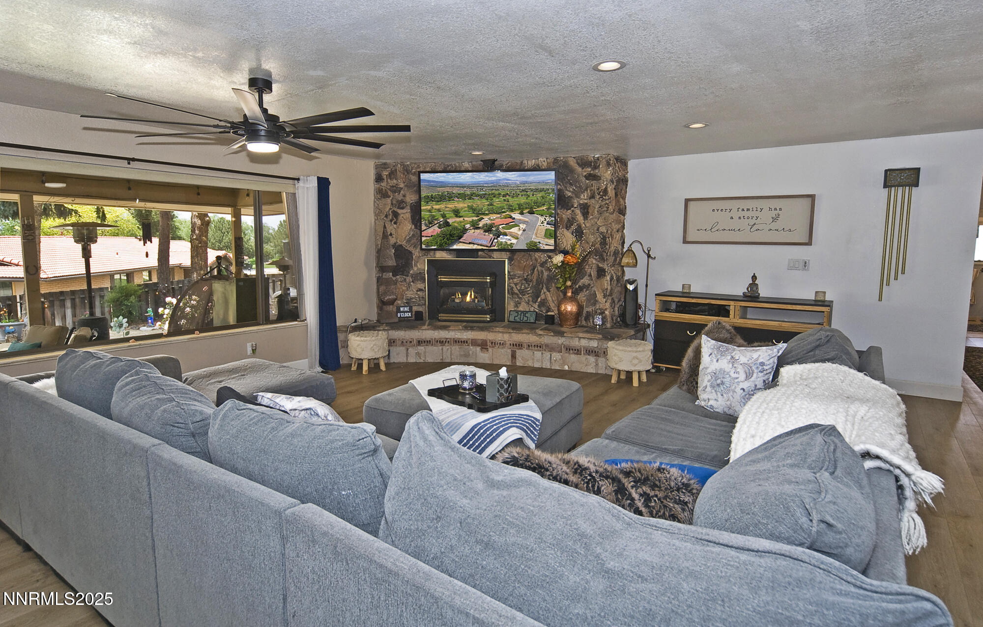 5705 Blue Hills Drive Reno, NV 89502 - Photo 21 of 56 a living room with furniture and a large window