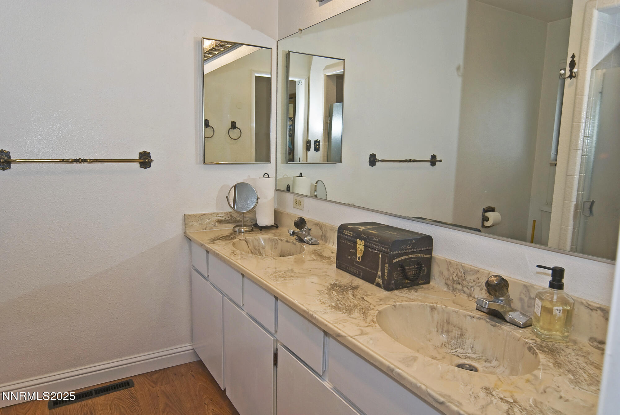 5705 Blue Hills Drive Reno, NV 89502 - Photo 28 of 56 a bathroom with a sink and a mirror