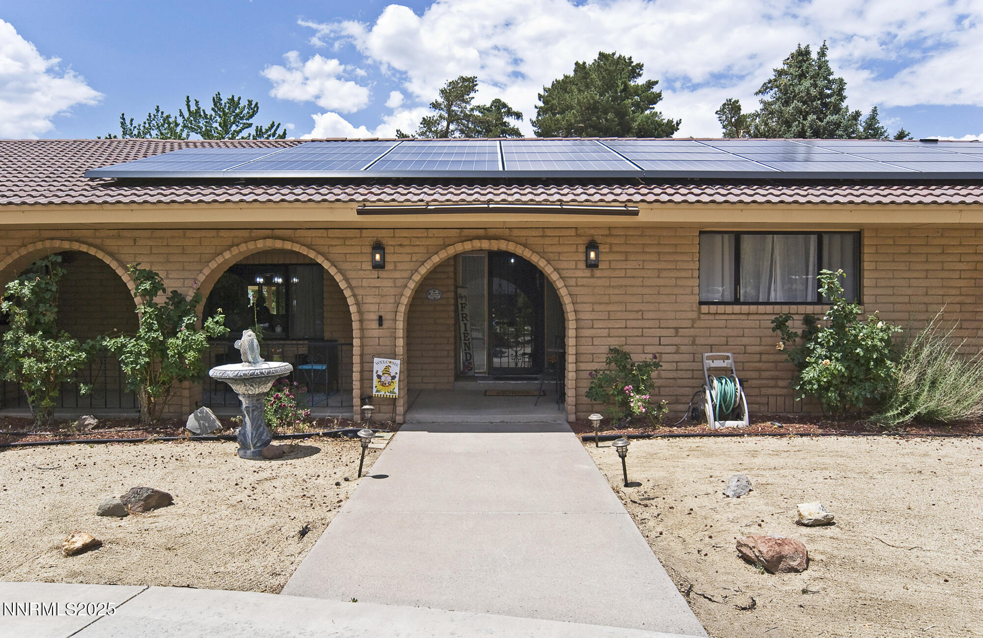 5705 Blue Hills Drive Reno, NV 89502 - Photo 3 of 56 a view of a building with a bench