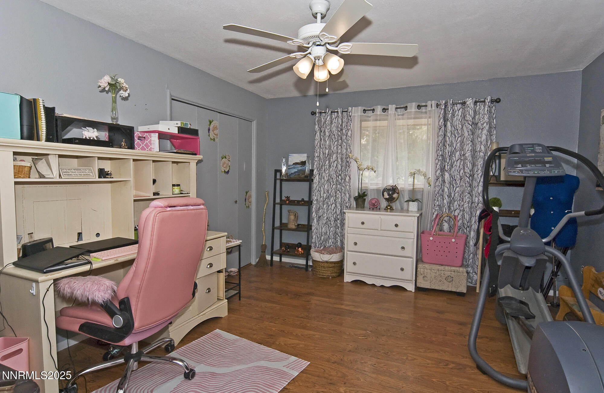 5705 Blue Hills Drive Reno, NV 89502 - Photo 32 of 56 a view of a workspace with furniture and gym equipment