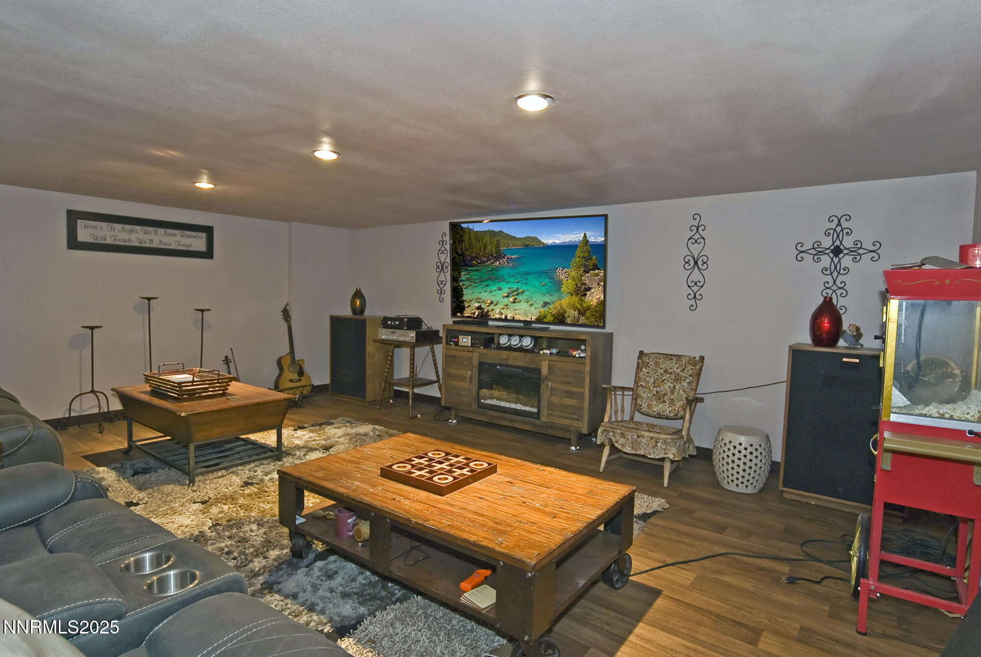 5705 Blue Hills Drive Reno, NV 89502 - Photo 35 of 56 a living room with furniture and a flat screen tv