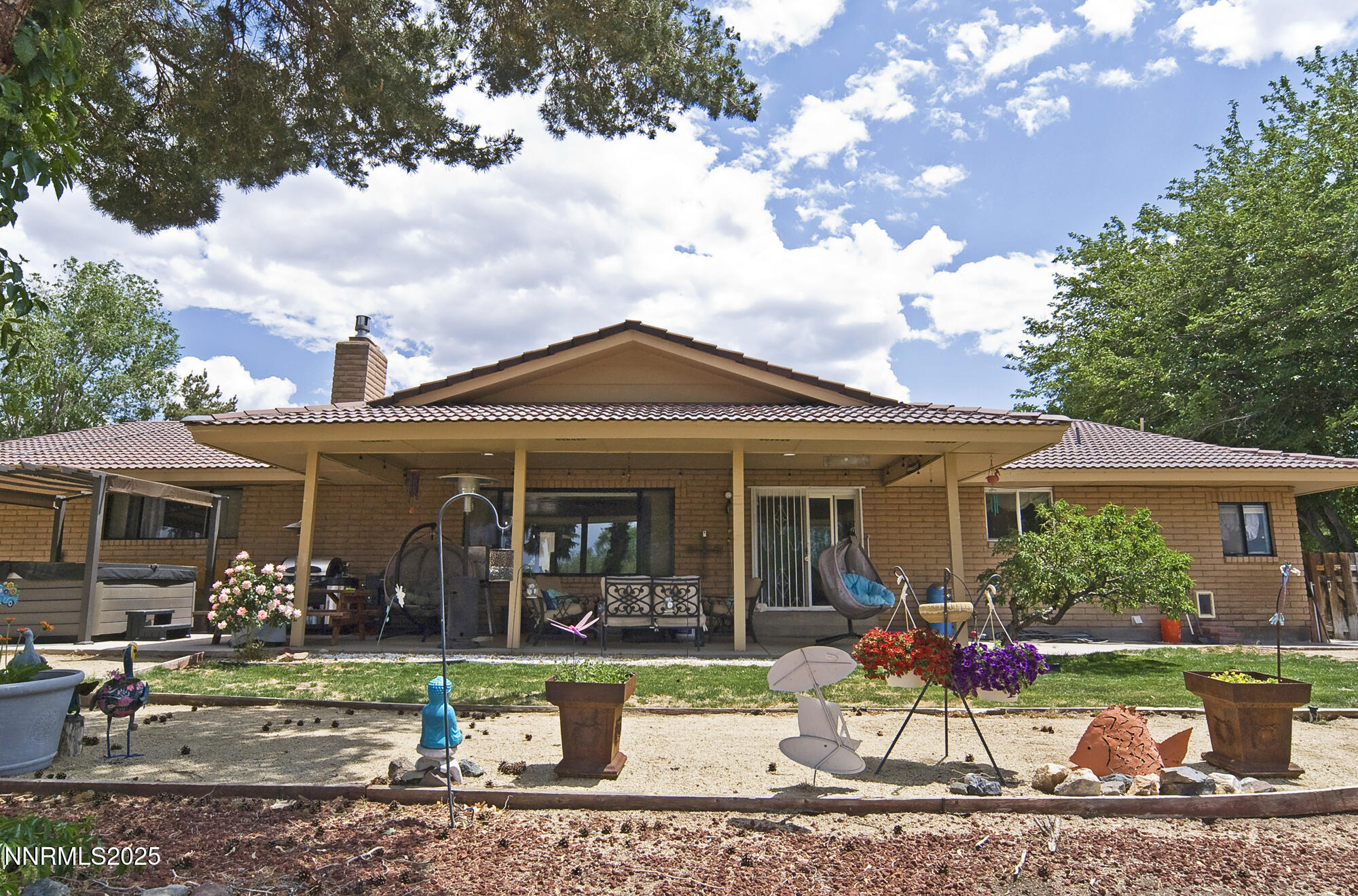 5705 Blue Hills Drive Reno, NV 89502 - Photo 39 of 56 a front view of a house with garden