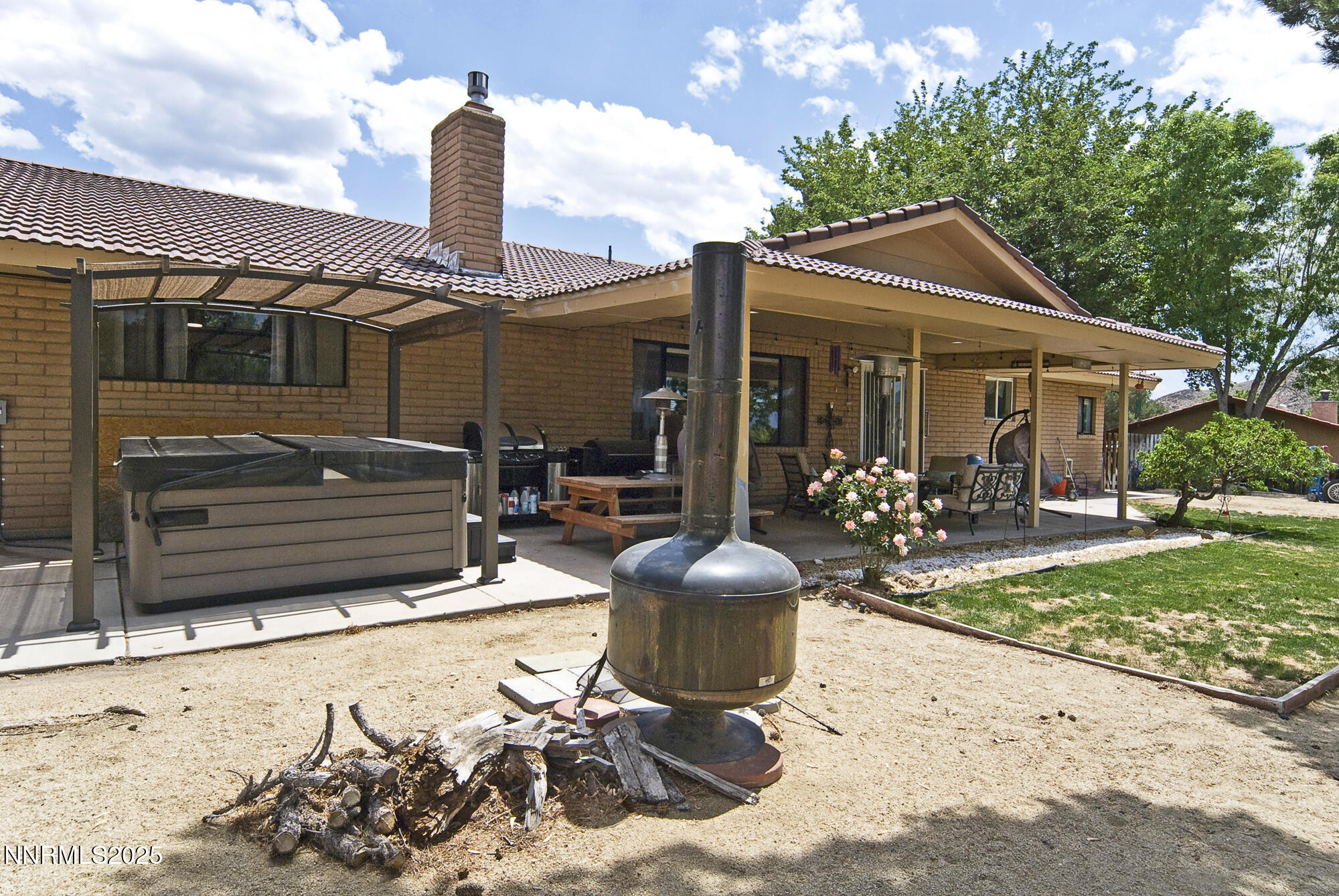 5705 Blue Hills Drive Reno, NV 89502 - Photo 43 of 56 a front view of a house with garden