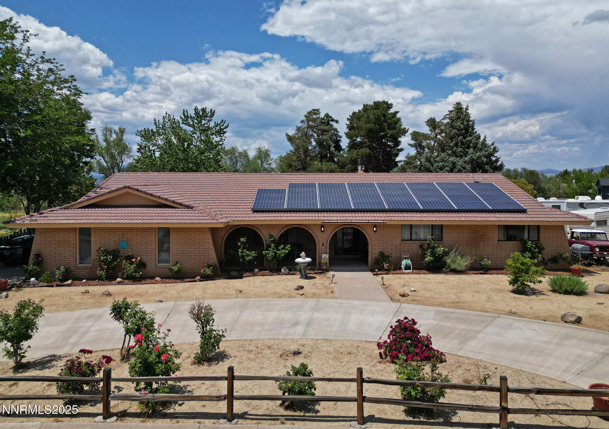 5705 Blue Hills Drive Reno, NV 89502 - Photo 46 of 56 front view of a house with a yard
