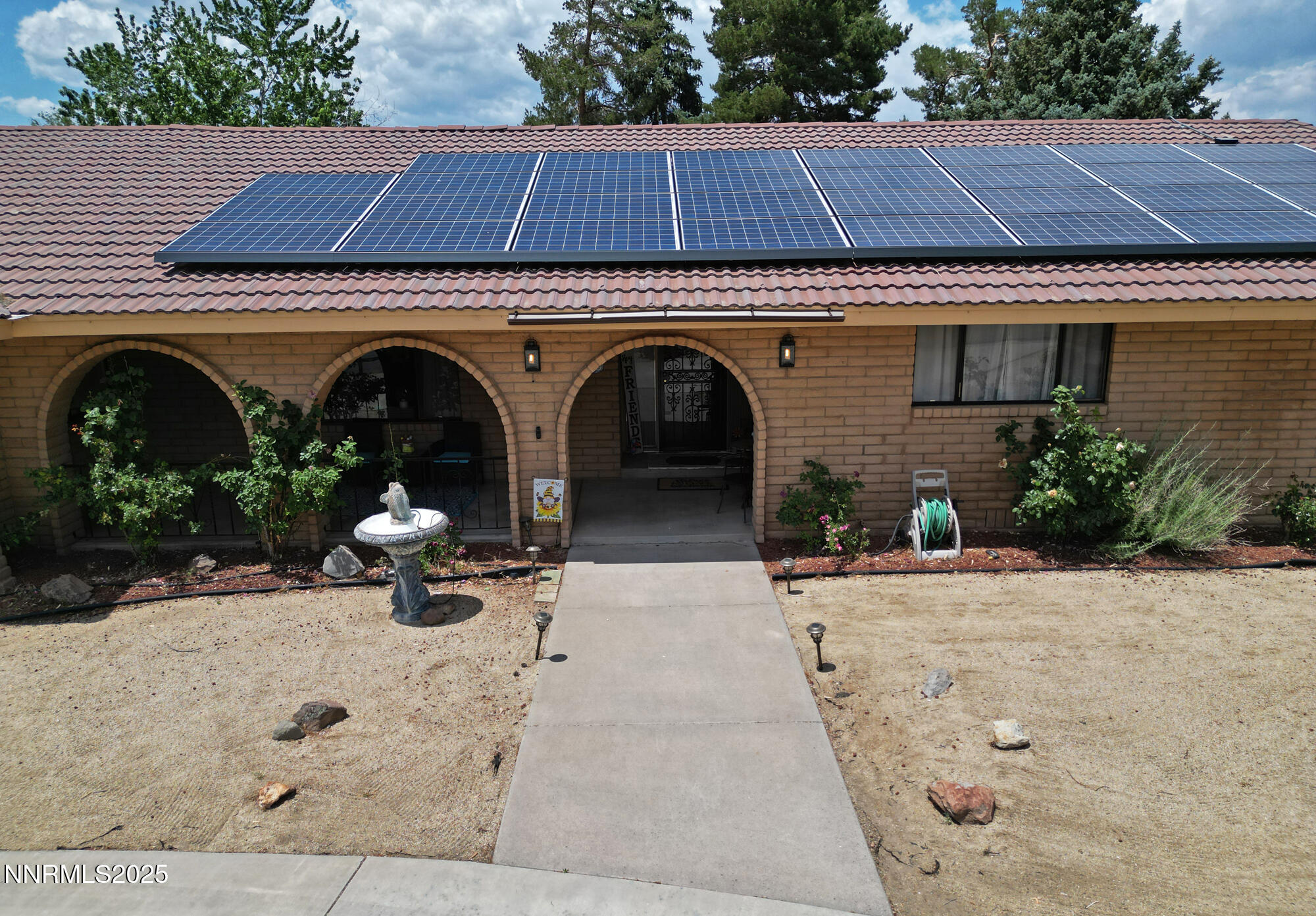 5705 Blue Hills Drive Reno, NV 89502 - Photo 56 of 56 a front view of a house with garden