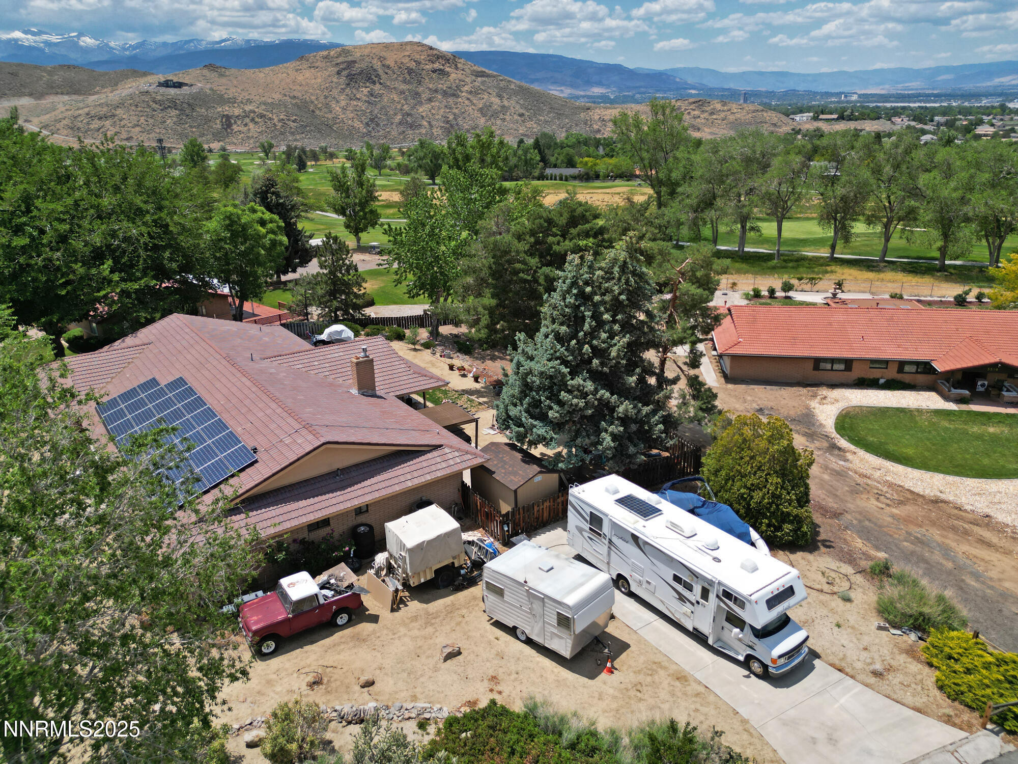 5705 Blue Hills Drive Reno, NV 89502 - Photo 6 of 56 an aerial view of a house with a garden