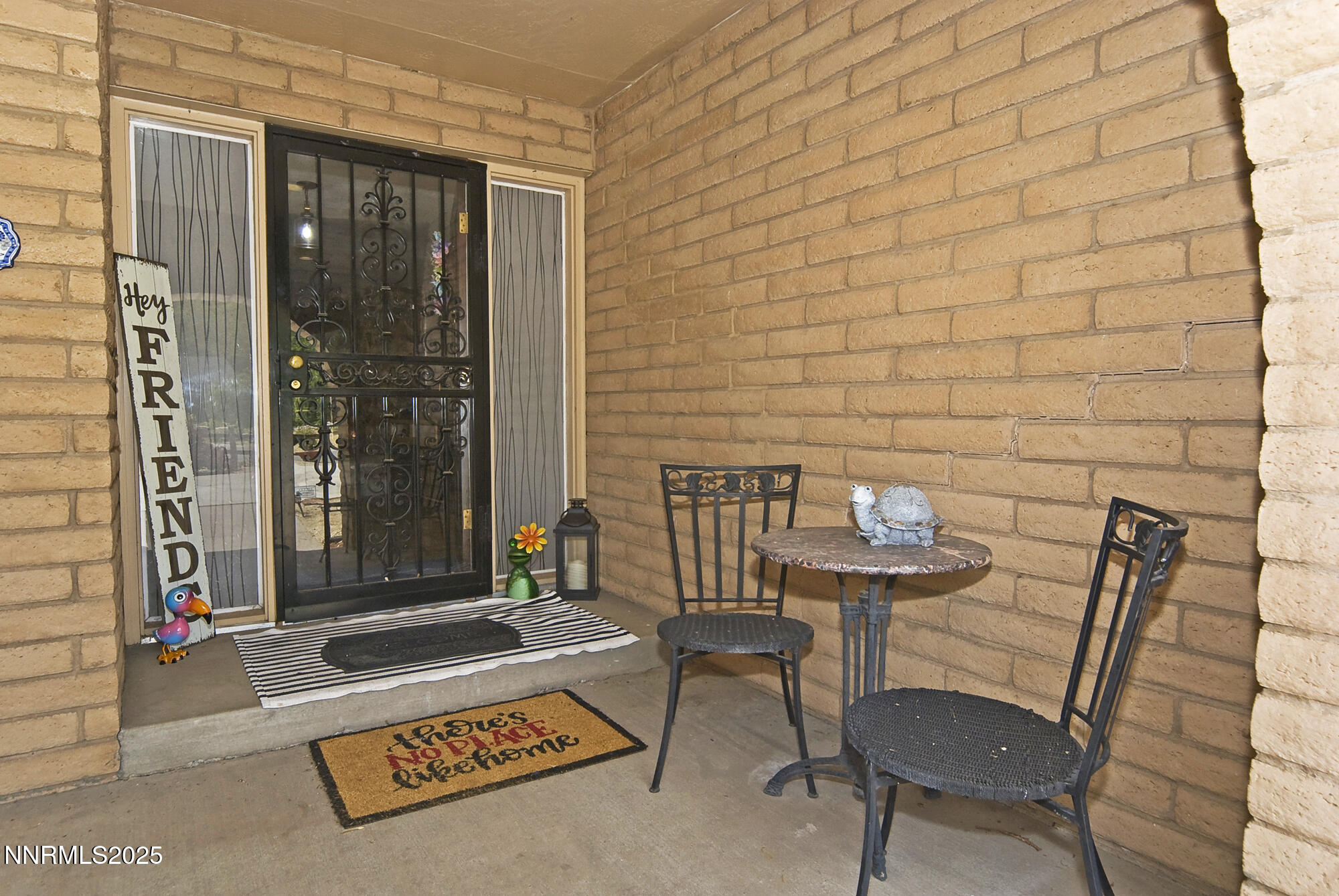 5705 Blue Hills Drive Reno, NV 89502 - Photo 10 of 56 a balcony with table and chairs