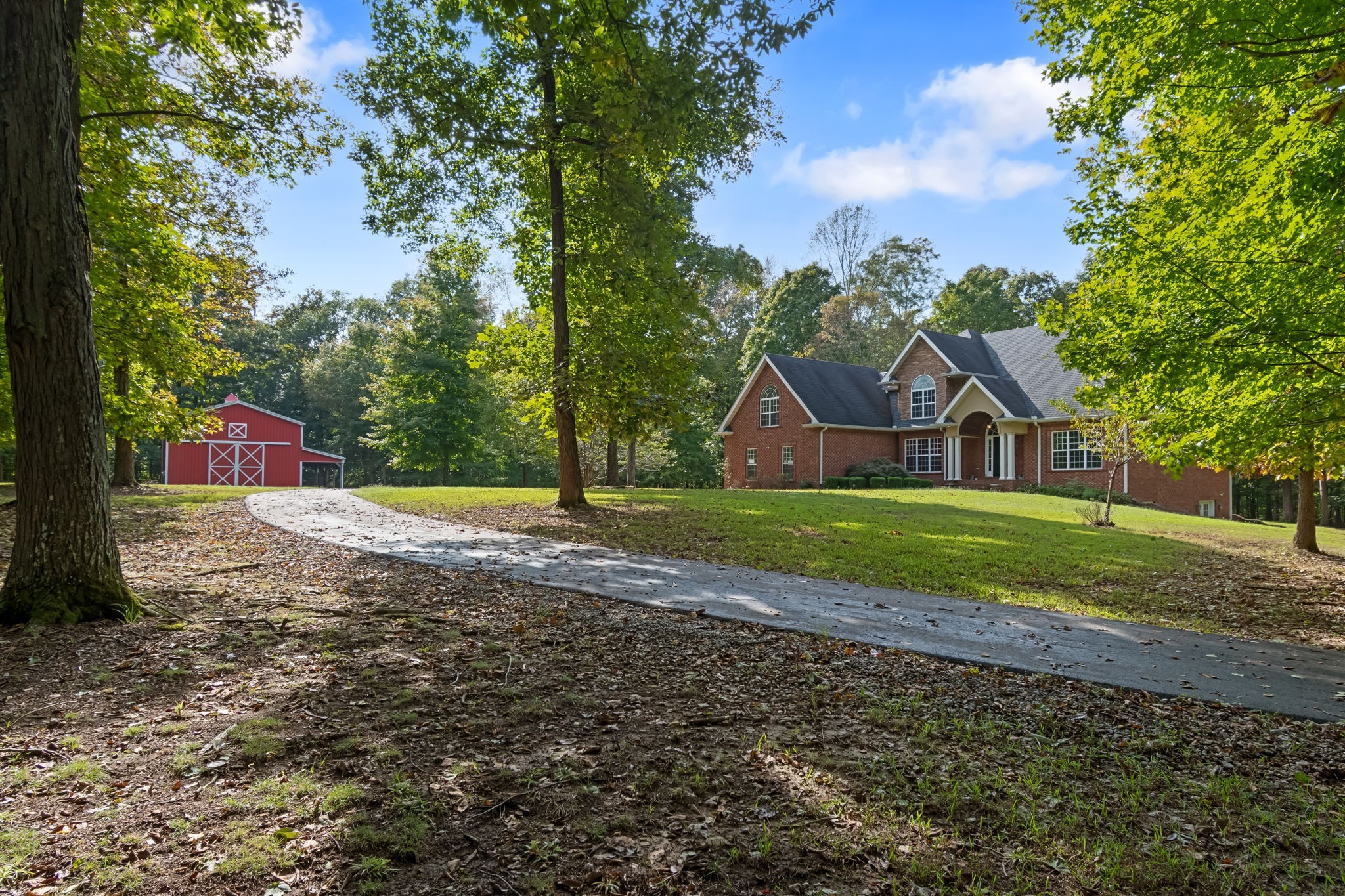 5756 Burgess Gower Road Pleasant View, TN 37146 - Photo 3 of 67 a view of house with backyard space and garden